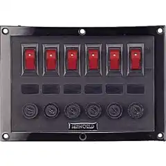 <p>Seks belyste brytere med sikringer.</p>
